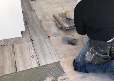Pro Installations Joe working on tile
