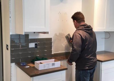 Pro Installations kitchen backsplash being installed